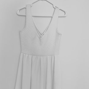 White sleeveless dress 👗